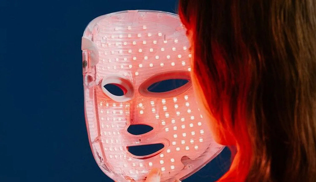 Red LED light therapy mask for at-home skincare, targeting acne and anti-aging with low-level light treatment.