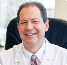 DR JOEL SCHLESSINGER